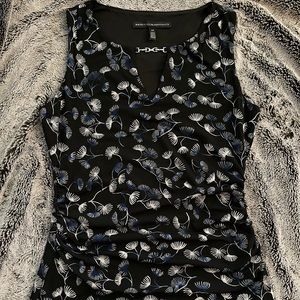 WHBM sleeveless v-cut blouse with silver chain detailing.